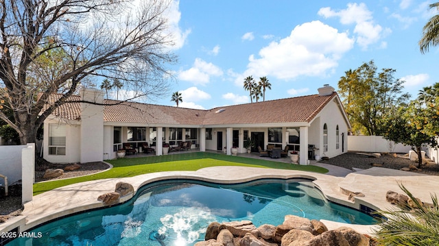 view of swimming pool with a patio area