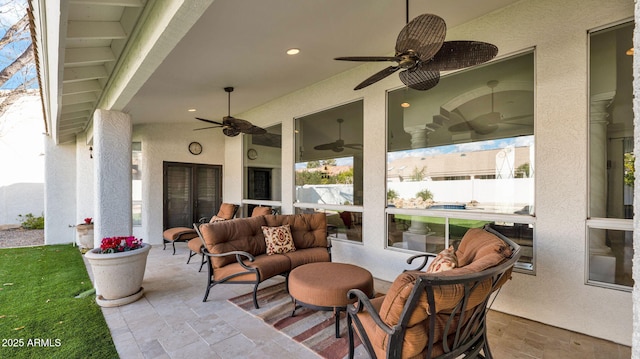 view of patio / terrace featuring outdoor lounge area and ceiling fan