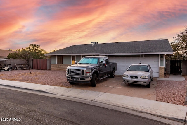 ranch-style home with a garage