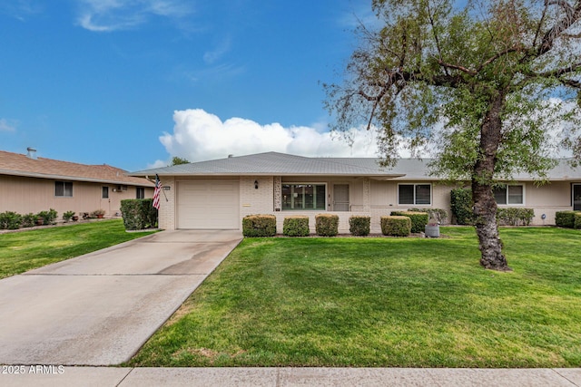 single story home featuring a garage and a front lawn