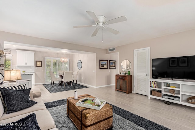 living room with ceiling fan