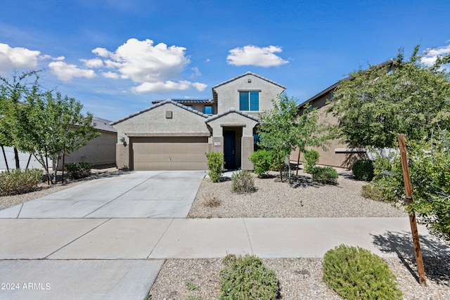 view of front of property featuring a garage