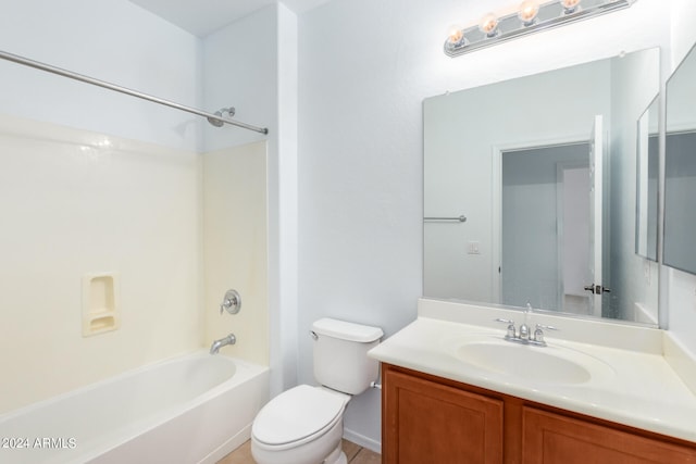 full bathroom with shower / bathtub combination, vanity, and toilet