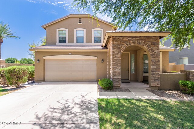 view of front of property featuring a garage