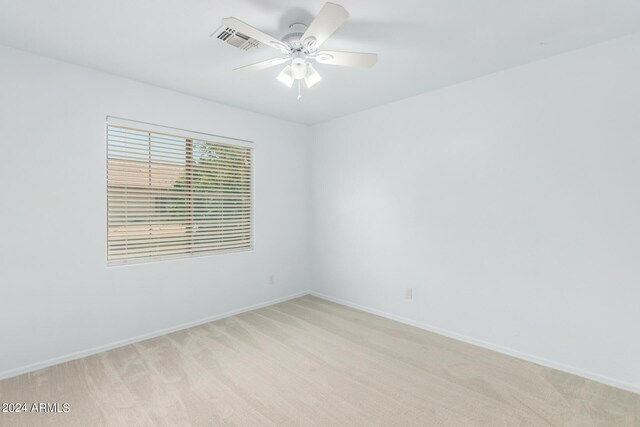 full bathroom featuring tile patterned flooring, shower / bath combination with curtain, toilet, and vanity