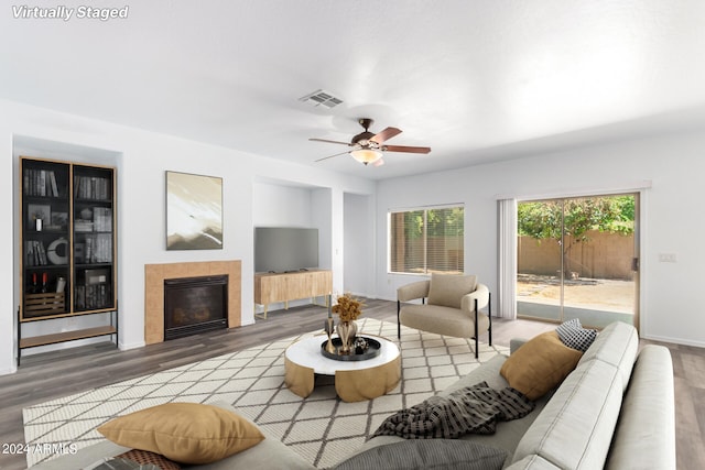 spare room with an inviting chandelier and wood-type flooring