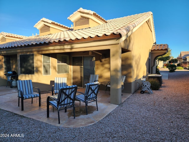 rear view of house with a patio area