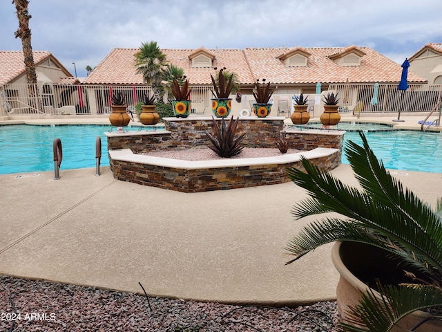 view of pool with a patio area