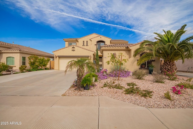 mediterranean / spanish-style house featuring a garage