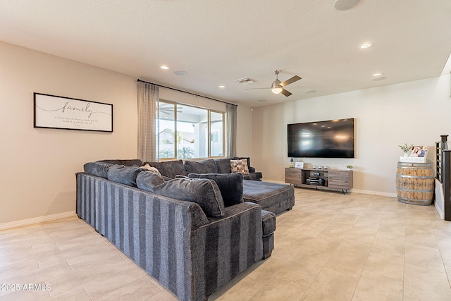 living room featuring baseboards, a ceiling fan, visible vents, and recessed lighting