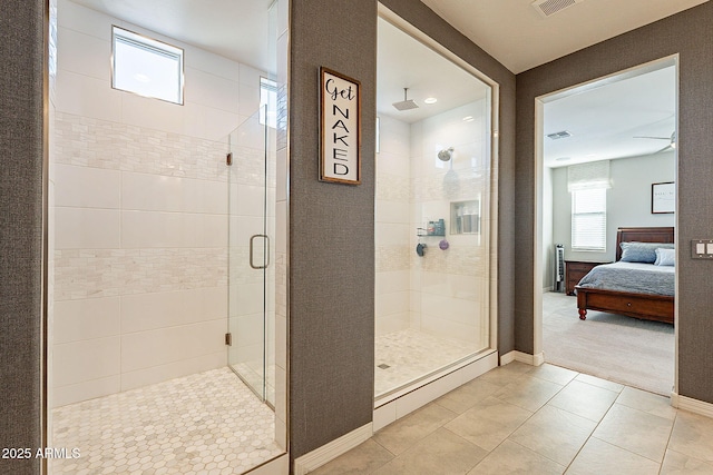 full bath with visible vents, baseboards, a shower stall, ensuite bath, and tile patterned floors