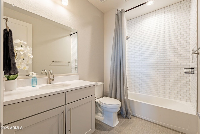 bathroom with toilet, vanity, tile patterned flooring, and shower / tub combo with curtain