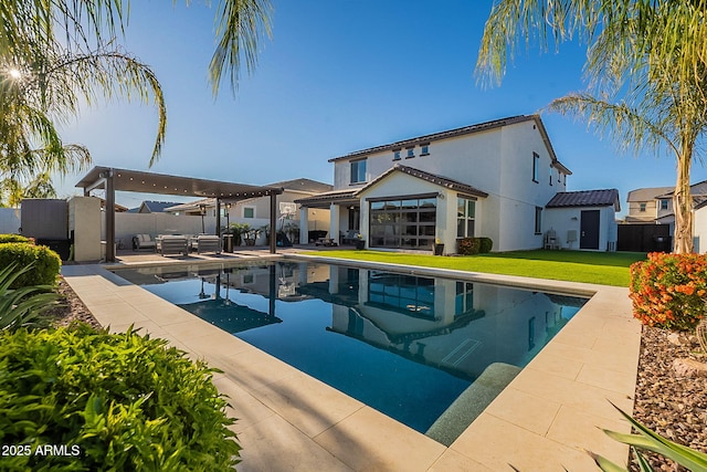 view of pool with a sunroom, a yard, a fenced backyard, a patio area, and a fenced in pool