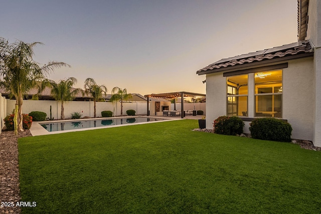 view of yard featuring a fenced backyard, a fenced in pool, a patio, and a pergola