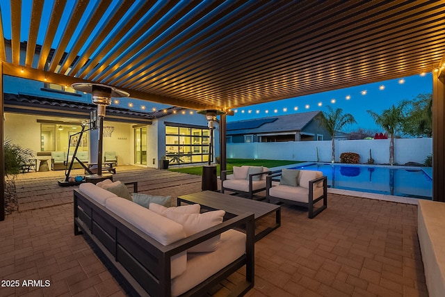 view of patio / terrace featuring a fenced backyard, outdoor lounge area, a fenced in pool, and a pergola