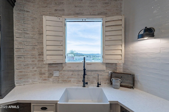 kitchen with a mountain view and sink