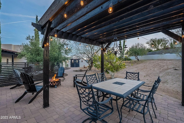 view of patio / terrace featuring a fire pit