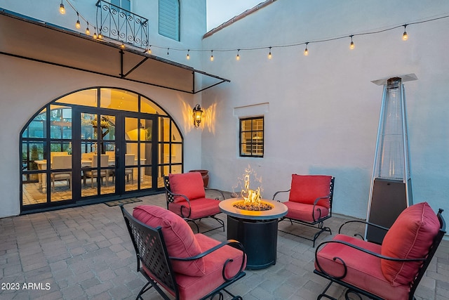 view of patio / terrace featuring a fire pit