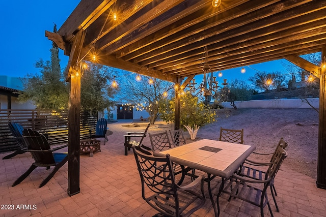 view of patio terrace at dusk