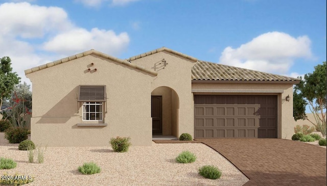 11416 E Utah Ave, Mesa, AZ 85212 - mediterranean / spanish house featuring a garage, decorative driveway, and stucco siding