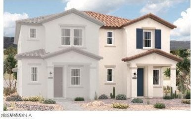 2807 N Claire Dr, Buckeye, AZ 85396 - mediterranean / spanish house featuring a tile roof and stucco siding