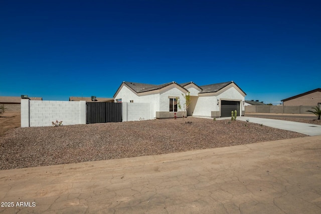 view of front of home with a garage