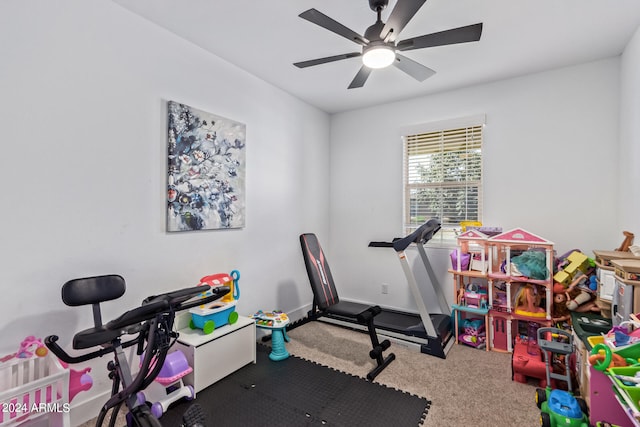 exercise room featuring carpet and ceiling fan