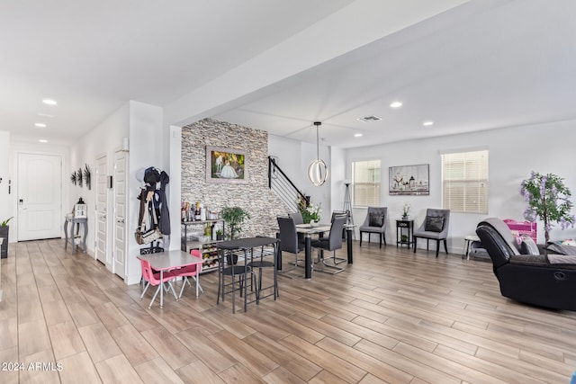 dining room with light wood-type flooring