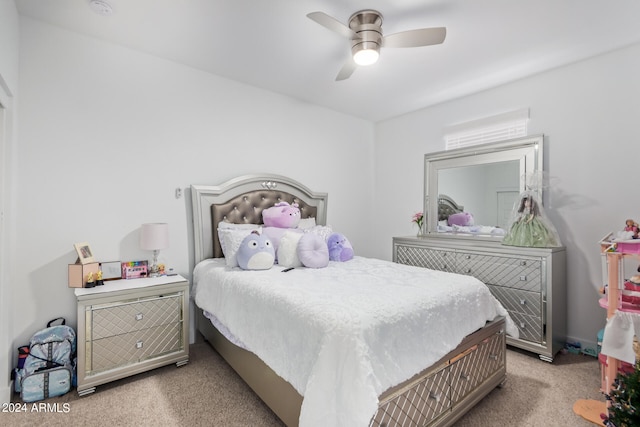 bedroom featuring light carpet and ceiling fan