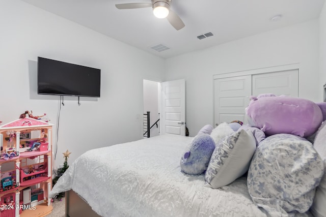 bedroom with a closet and ceiling fan