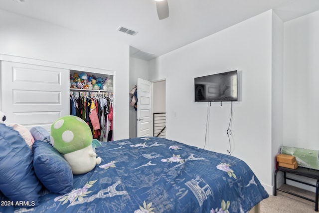 bedroom featuring ceiling fan, carpet floors, and a closet