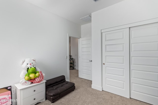 sitting room with light colored carpet