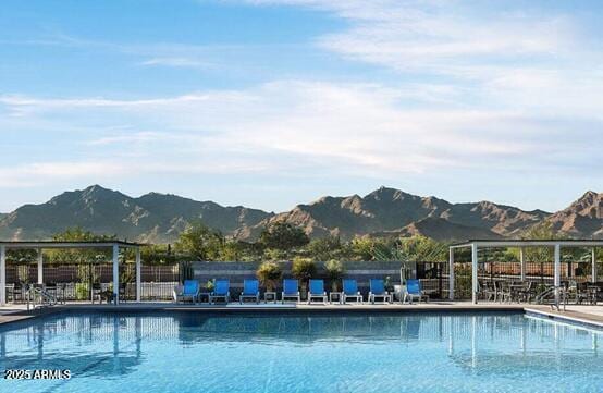 view of pool featuring a mountain view