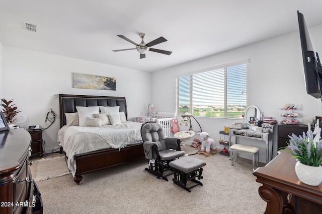 carpeted bedroom with ceiling fan