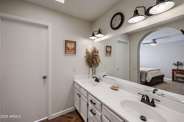 bathroom with vanity and ceiling fan