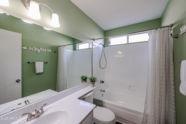 full bathroom with vanity, toilet, and shower / tub combo