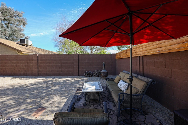 view of patio / terrace with central AC unit