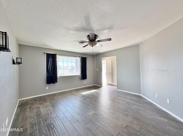 unfurnished room with hardwood / wood-style floors, a textured ceiling, and ceiling fan