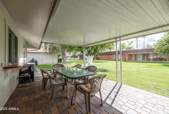 view of patio with outdoor dining area