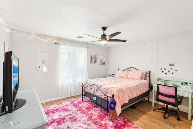 bedroom featuring ceiling fan and hardwood / wood-style floors