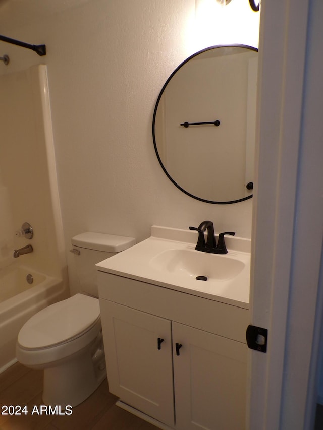 full bathroom with vanity, shower / bath combination, and toilet