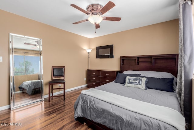 1133 N 84th Pl, Scottsdale, AZ 85257 - bedroom featuring dark wood-type flooring and a ceiling fan