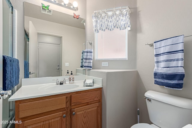 6610 E University Dr Unit 2, Mesa, AZ 85205 - bathroom featuring toilet and vanity