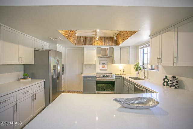 6608 E Ranch Rd, Cave Creek, AZ 85331 - kitchen with appliances with stainless steel finishes, wall chimney range hood, and light countertops