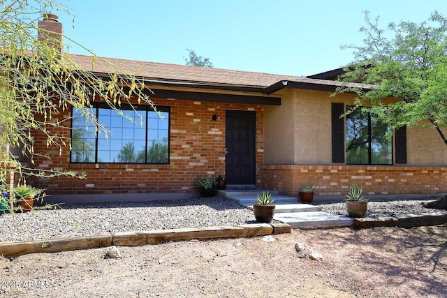 6608 E Ranch Rd, Cave Creek, AZ 85331 - ranch-style house with brick siding and a chimney