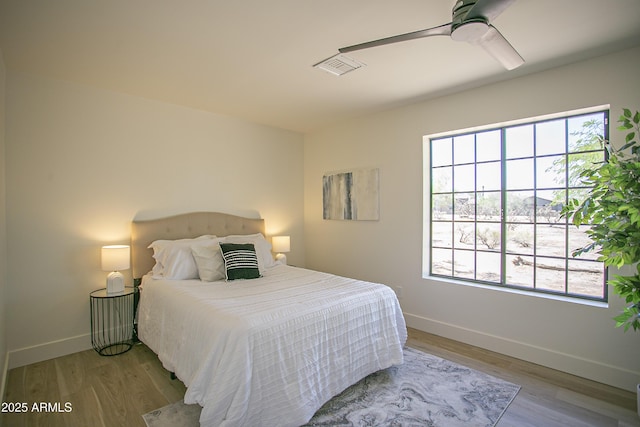 6608 E Ranch Rd, Cave Creek, AZ 85331 - bedroom featuring wood finished floors and a ceiling fan