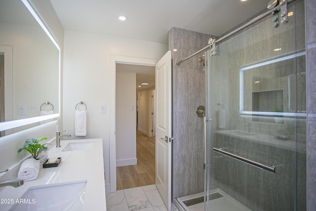 6608 E Ranch Rd, Cave Creek, AZ 85331 - bathroom featuring a stall shower, double vanity, marble finish flooring, and recessed lighting