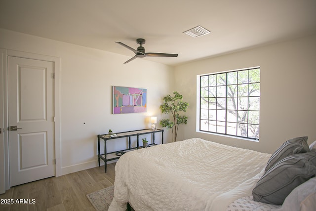 6608 E Ranch Rd, Cave Creek, AZ 85331 - bedroom with wood finished floors and ceiling fan