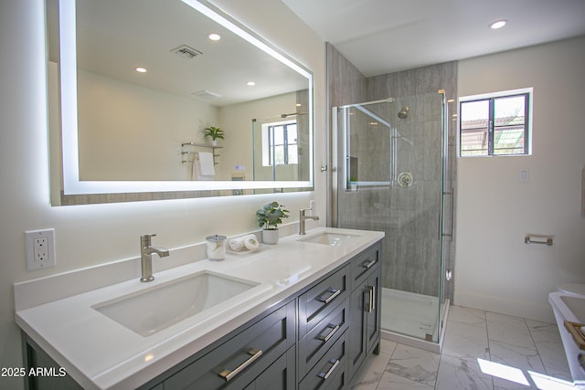 6608 E Ranch Rd, Cave Creek, AZ 85331 - bathroom with plenty of natural light, double vanity, a shower stall, marble finish floors, and recessed lighting
