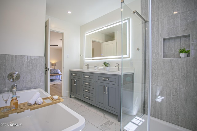 6608 E Ranch Rd, Cave Creek, AZ 85331 - ensuite bathroom featuring a bath, double vanity, marble finish flooring, and a stall shower